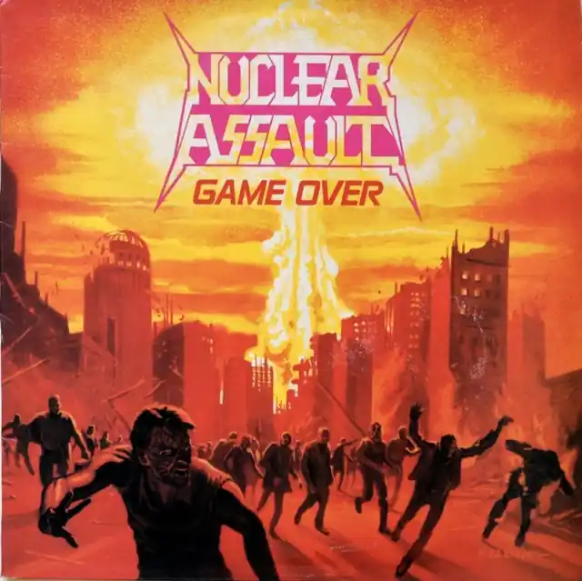 NUCLEAR ASSAULT - GAME OVER (ULTRA CLEAR WITH ORANGE CRUSH SPLATTERS VINYL) (I) (Vinyl LP) Time-Limited