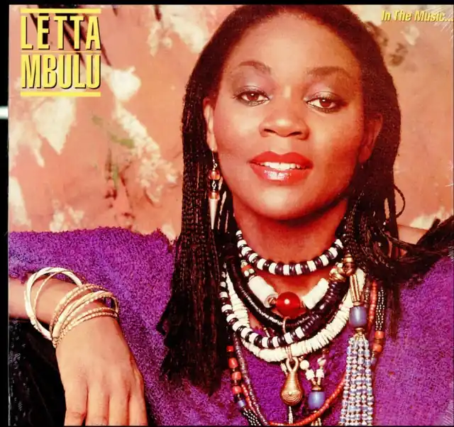 Trusted Brand MBULU,LETTA - IN THE MUSIC THE VILLAGE NEVER ENDS (Vinyl LP)